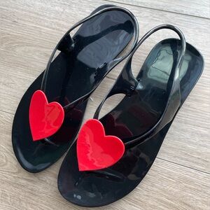 Jelly black flat sandals with heart. It is perfect for summer. Easy to clean